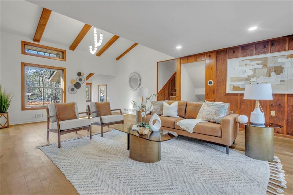 260 Devilla Trace Fayetteville, GA 30214 - Photo 7 of 47 a living room with furniture and a large window