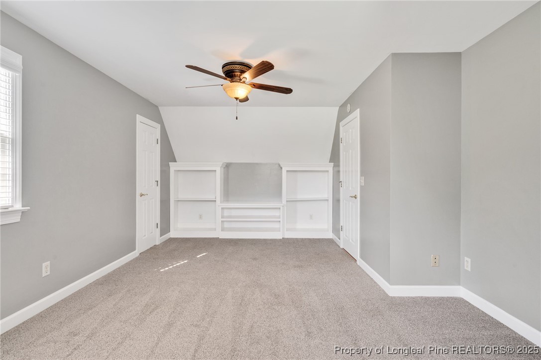 5247 Old Stage Road North Angier, NC 27501 - Photo 22 of 42 a view of a room with a ceiling fan and window
