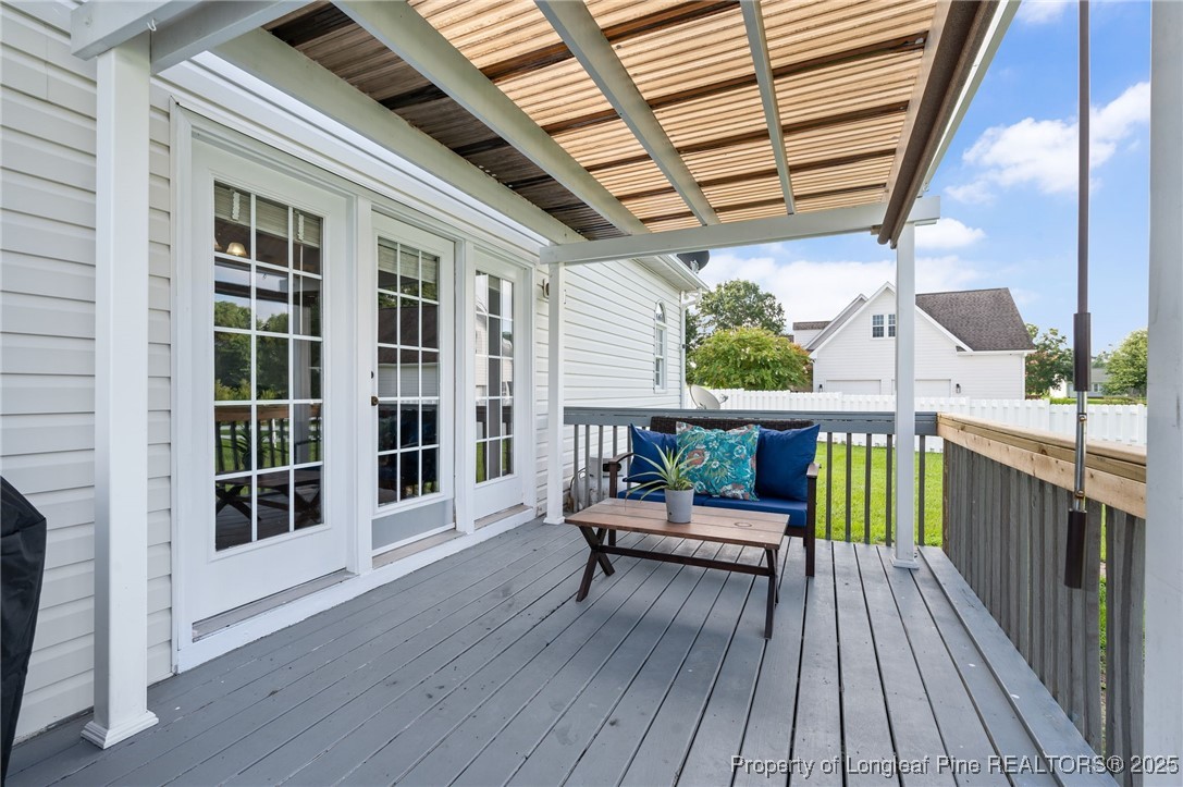 5247 Old Stage Road North Angier, NC 27501 - Photo 29 of 42 a view of a balcony with chairs