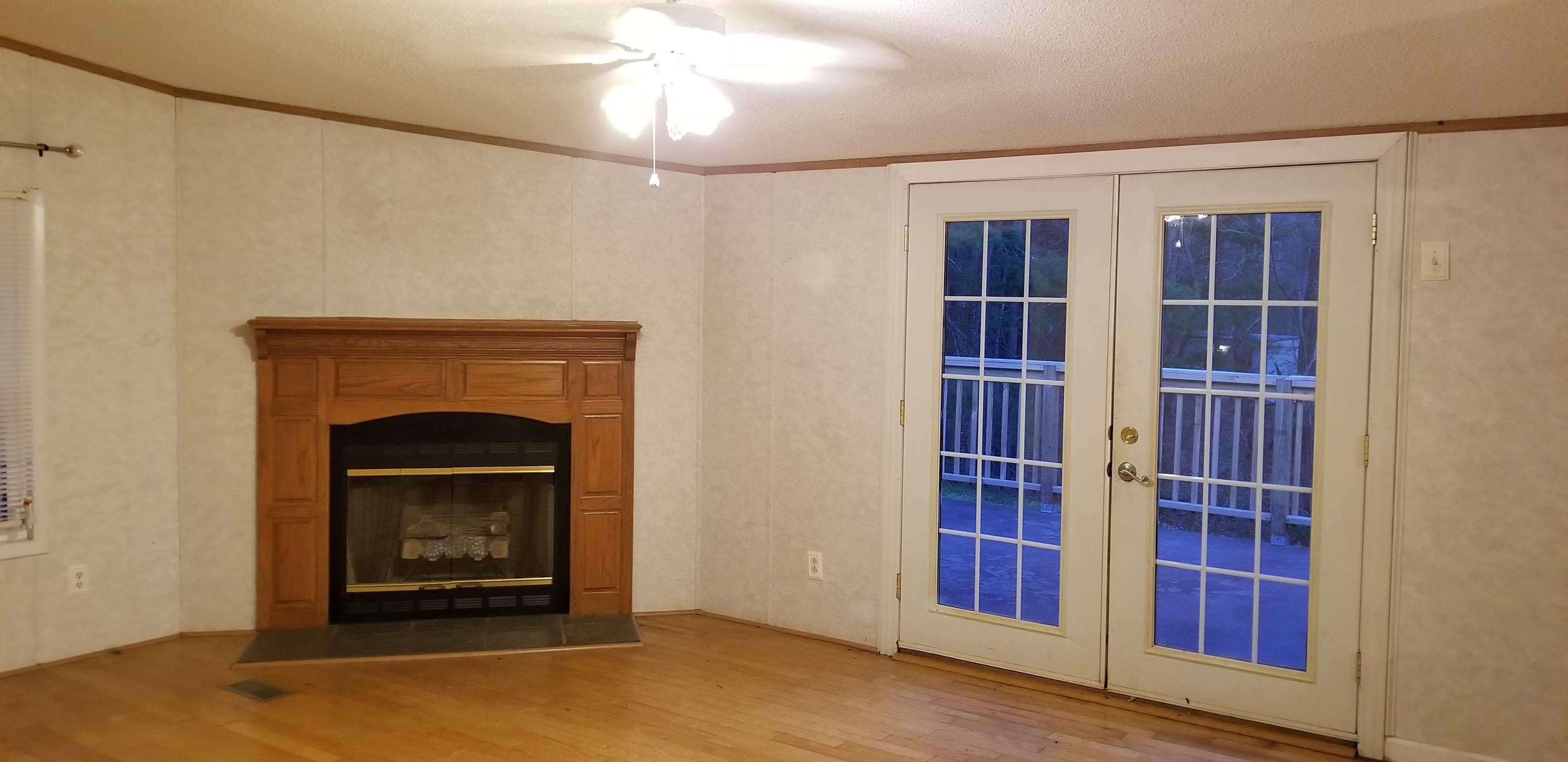 85 Sunset Ridge Road Callaway, VA 24067 - Photo 8 of 43 a view of livingroom with furniture and a fireplace