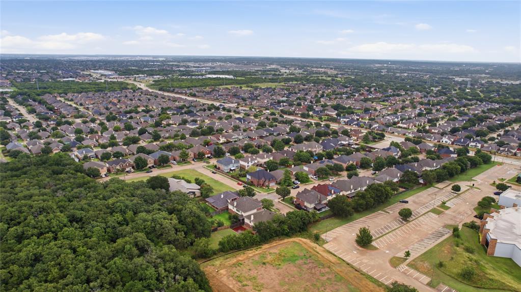 10001 Thurman Road Fort Worth, TX 76244 - Photo 37 of 40 Expansive residential area featuring numerous single-family homes with varying rooflines and mature landscaping