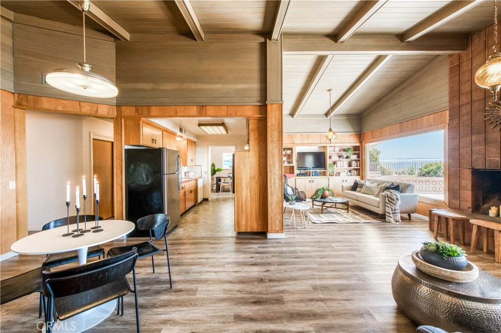 8 Ocean Front Lane, Unit AB Cayucos, CA 93430 - Photo 12 of 36 a living room with furniture and a table