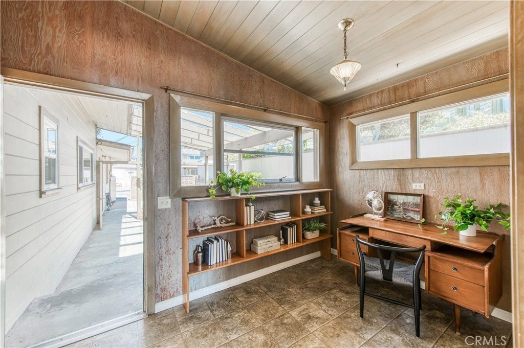 8 Ocean Front Lane, Unit AB Cayucos, CA 93430 - Photo 23 of 36 a reading room with furniture and a window