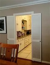 a lobby with furniture and a table