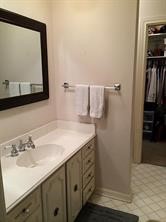 2103 Swift Boulevard Houston, TX 77030 - Photo 21 of 23 a bathroom with a sink and a mirror