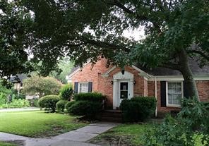 2103 Swift Boulevard Houston, TX 77030 - Photo 23 of 23 a front view of a house with a yard and green space