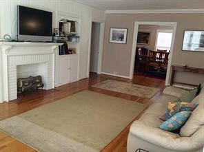 2103 Swift Boulevard Houston, TX 77030 - Photo 9 of 23 a living room with furniture and a flat screen tv