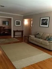 a view of a chairs and a table in a room