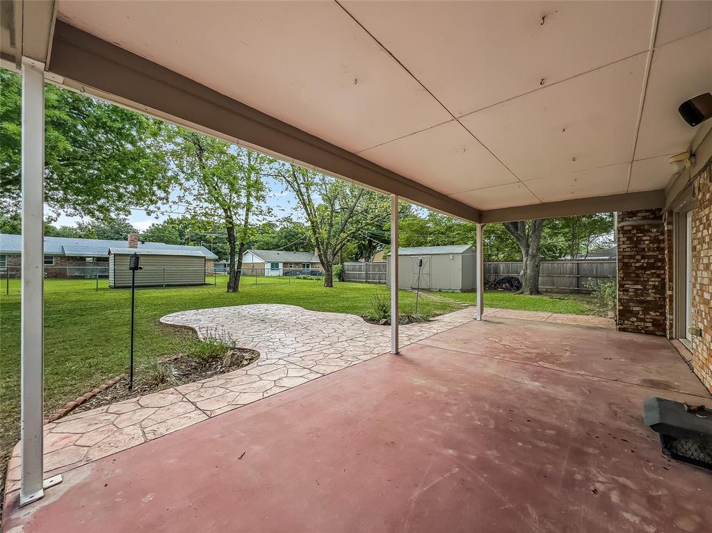 220 Cooper Drive Hurst, TX 76053 - Photo 24 of 27 a view of a yard with porch
