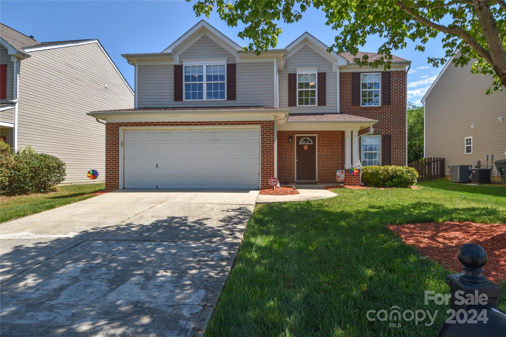 1472 Haverford Road Northwest Concord, NC 28027 - Photo 1 of 30 a view of a yard in front of a white house