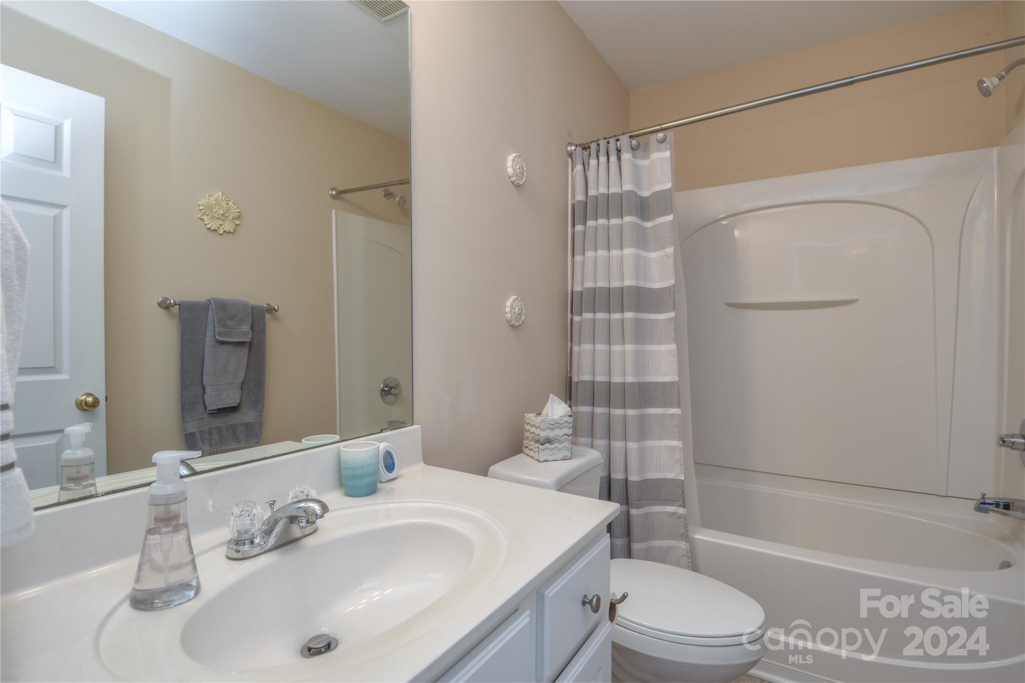 1472 Haverford Road Northwest Concord, NC 28027 - Photo 16 of 30 a bathroom with a sink toilet and shower