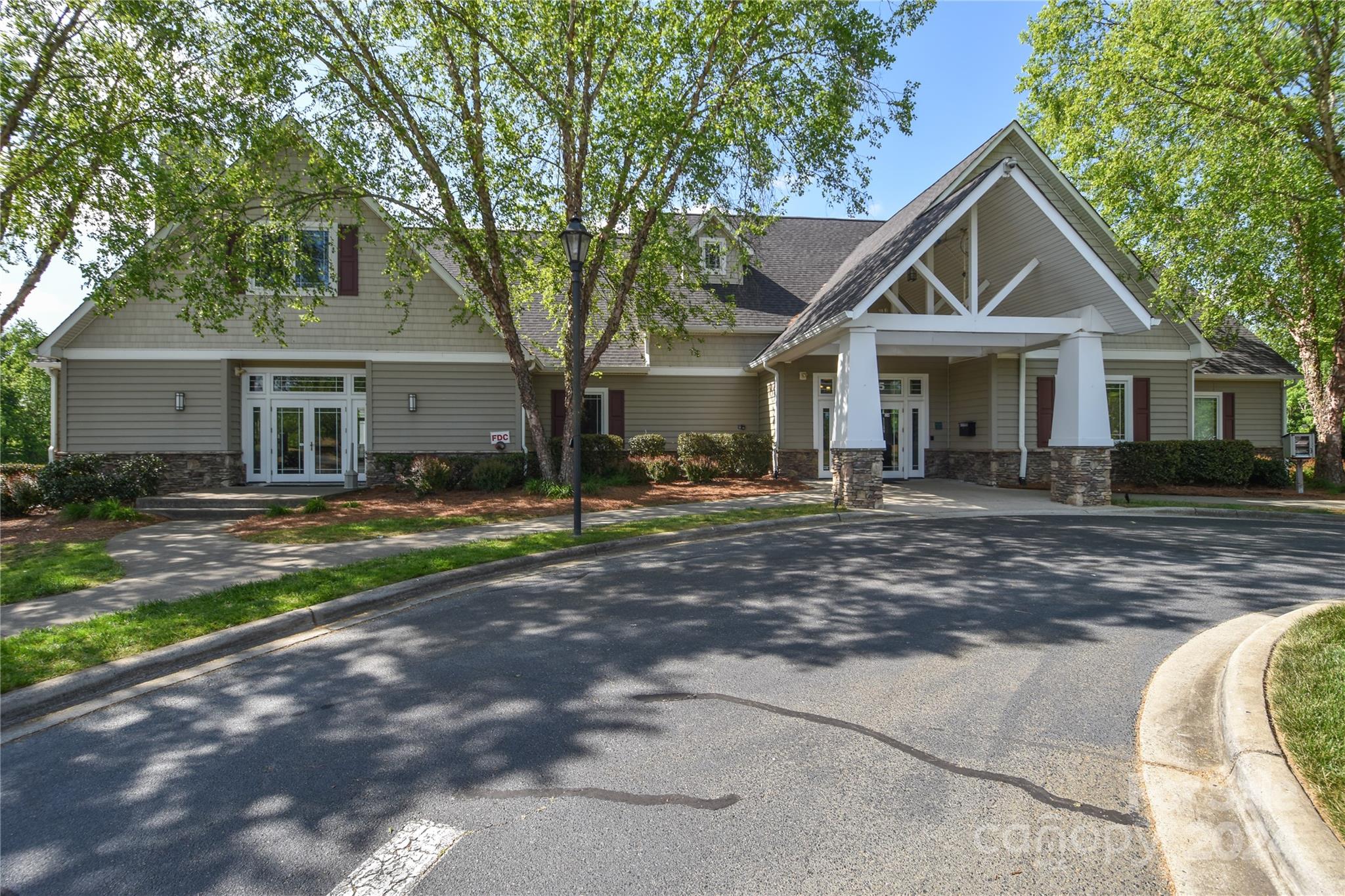 1472 Haverford Road Northwest Concord, NC 28027 - Photo 28 of 30 a front view of a house with a yard