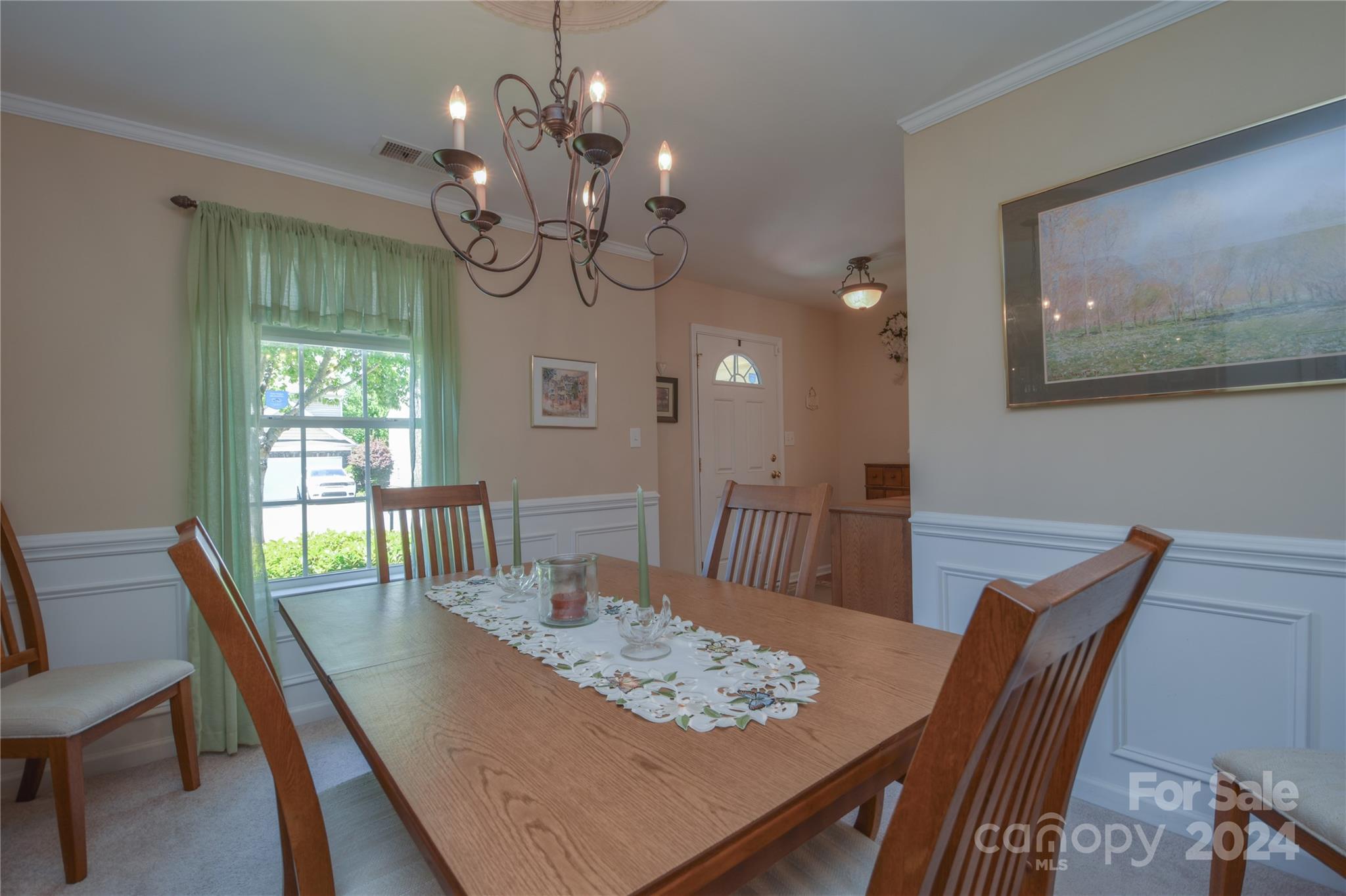 1472 Haverford Road Northwest Concord, NC 28027 - Photo 8 of 30 a view of a dining room with furniture wooden floor and chandelier