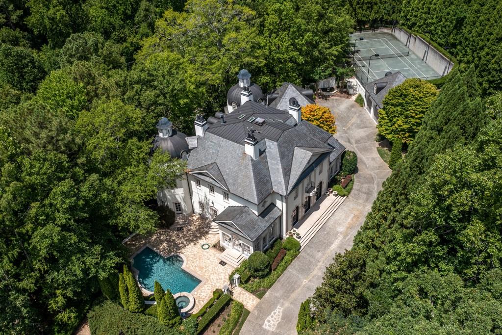 3861 Randall Mill Road Northwest Atlanta, GA 30327 - Photo 1 of 1 an aerial view of a house with outdoor space