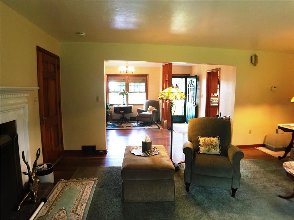 149 Township Line Road Butler, PA 16002 - Photo 7 of 25 The living room's cozy fireplace area