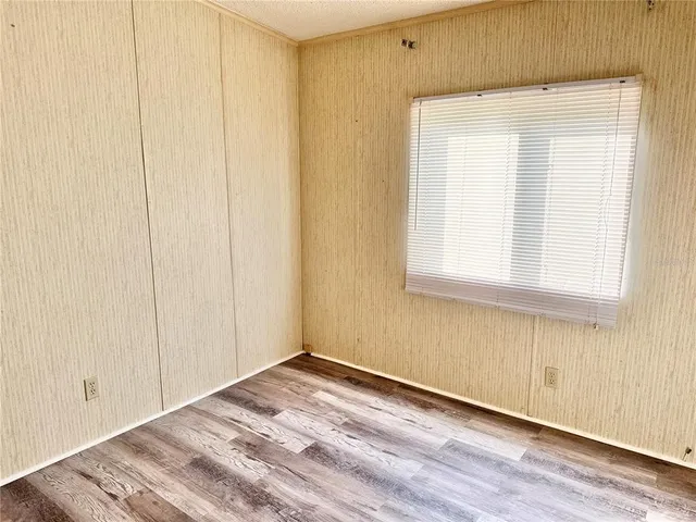 a view of a room that has a window in it