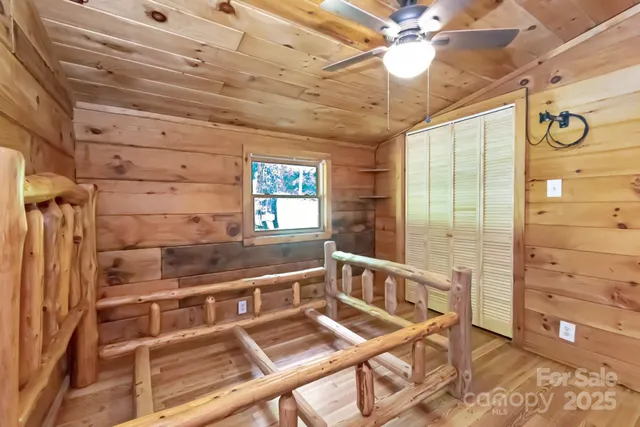 a view of a balcony with a ceiling fan