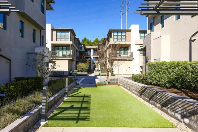 a view of a street with buildings