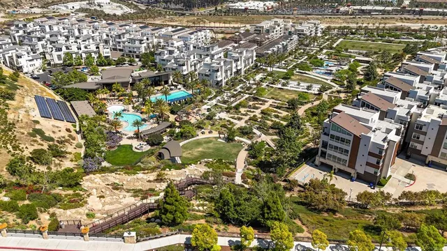 a view of residential houses with tree s