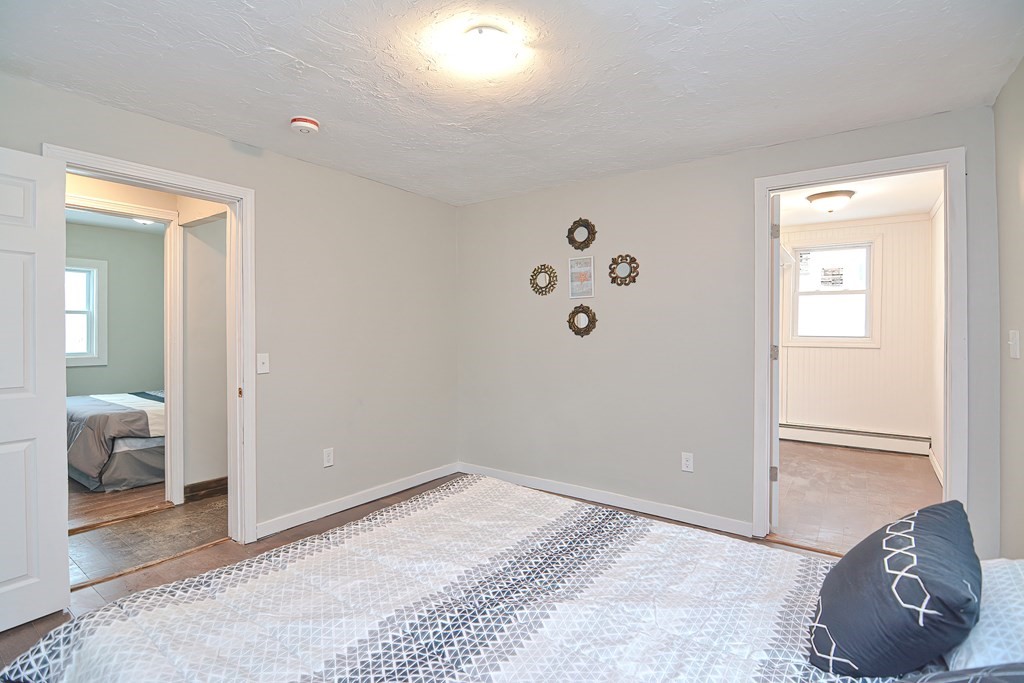 519 S Road Templeton, MA 01468 - Photo 12 of 30 a view of a livingroom with wooden floor and bedroom