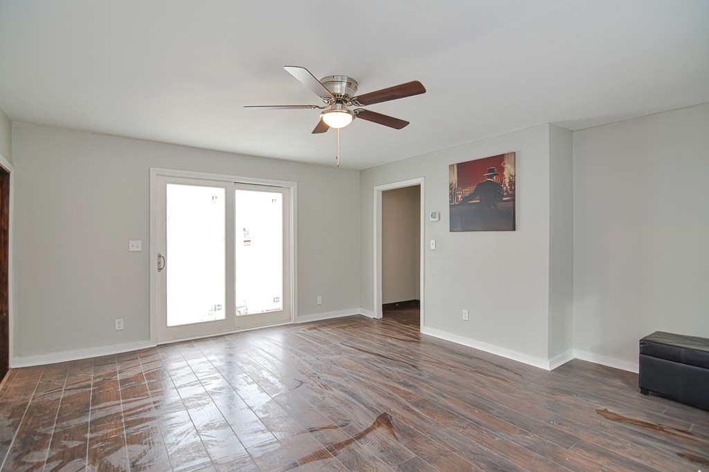 519 S Road Templeton, MA 01468 - Photo 20 of 30 a view of an empty room with window and wooden floor