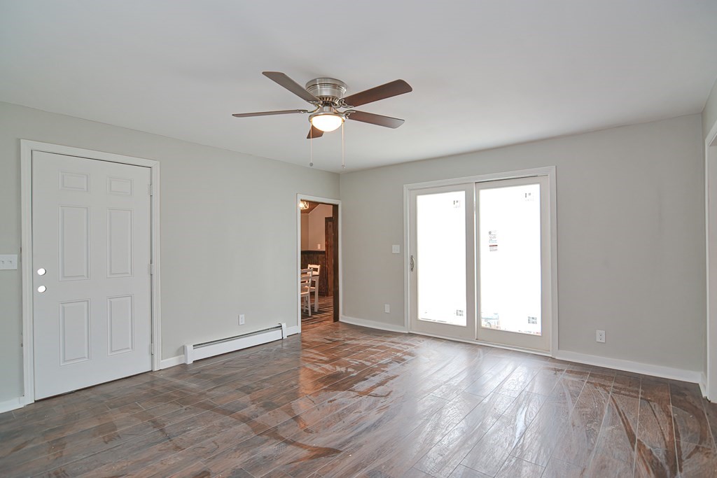 519 S Road Templeton, MA 01468 - Photo 21 of 30 a view of empty room with wooden floor and fan