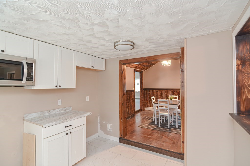 519 S Road Templeton, MA 01468 - Photo 7 of 30 a view of a kitchen with a sink and cabinets