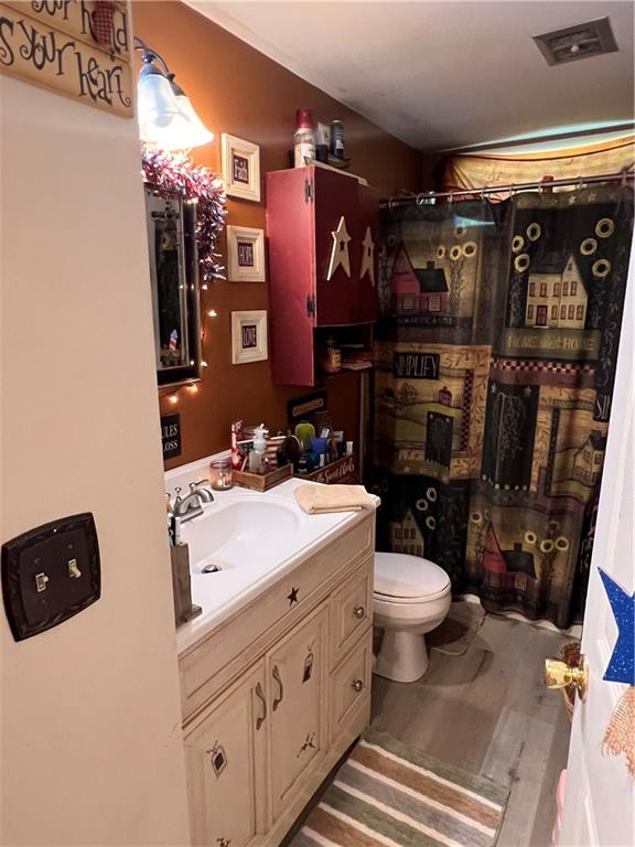 434 Highway 356 Apollo, PA 15613 - Photo 11 of 18 a bathroom with a toilet sink and mirror