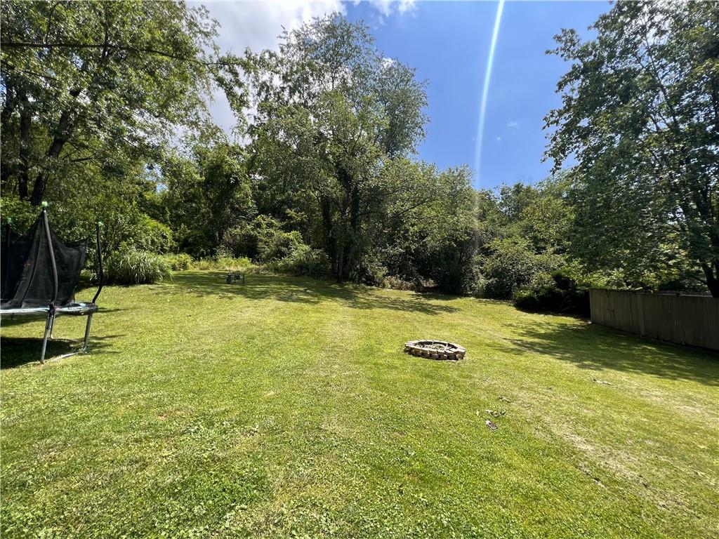 434 Highway 356 Apollo, PA 15613 - Photo 18 of 18 a view of a swimming pool with a bench and trees around