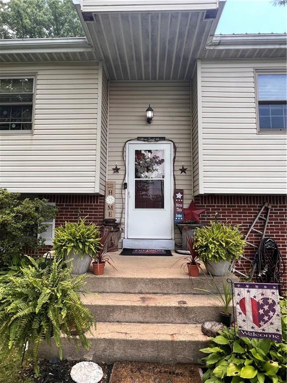 434 Highway 356 Apollo, PA 15613 - Photo 2 of 18 a front view of a house with a yard