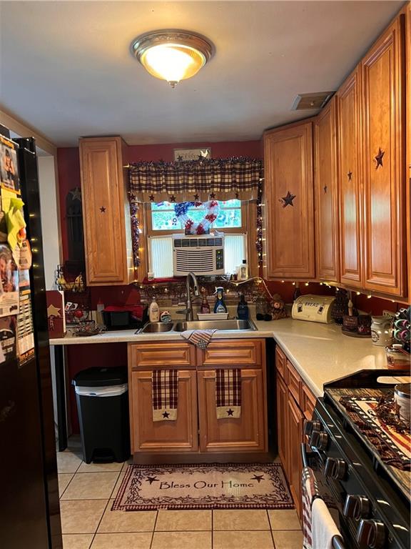 434 Highway 356 Apollo, PA 15613 - Photo 5 of 18 a kitchen with a stove and a refrigerator
