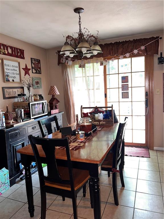 434 Highway 356 Apollo, PA 15613 - Photo 6 of 18 a view of a dining room with furniture window and outside view