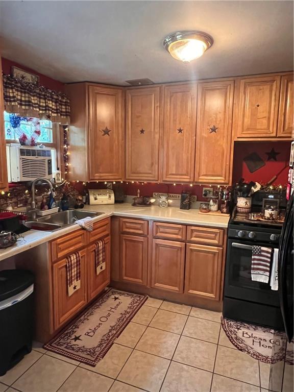 434 Highway 356 Apollo, PA 15613 - Photo 9 of 18 a kitchen with stainless steel appliances granite countertop a stove a sink and a microwave