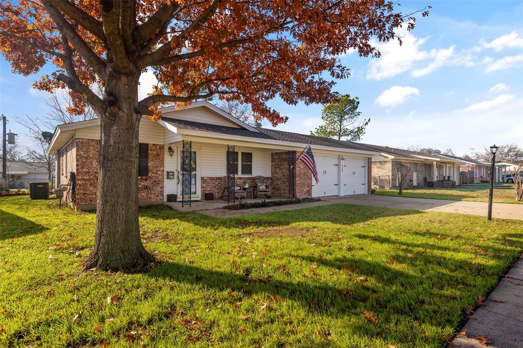 708 East Prairie View Road Crowley, TX 76036 - Photo 2 of 21 Brick and siding exterior with a covered front porch