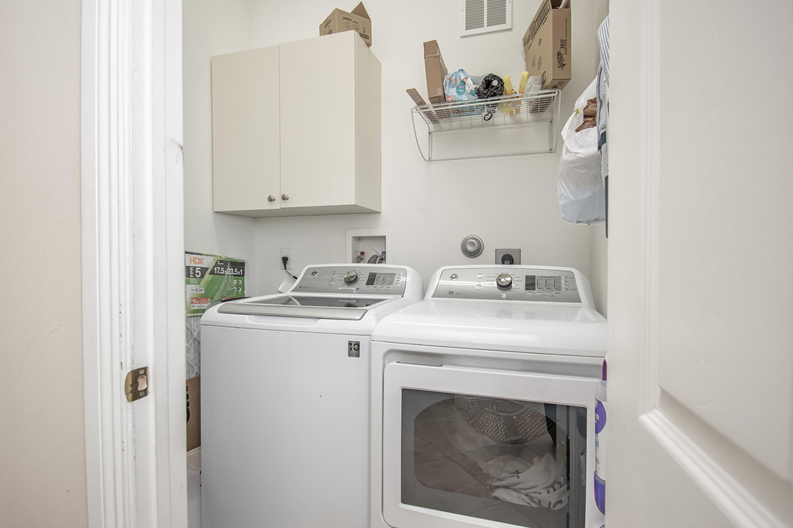9851 Palma Vista Way Boca Raton, FL 33428 - Photo 30 of 33 a utility room with dryer and washer