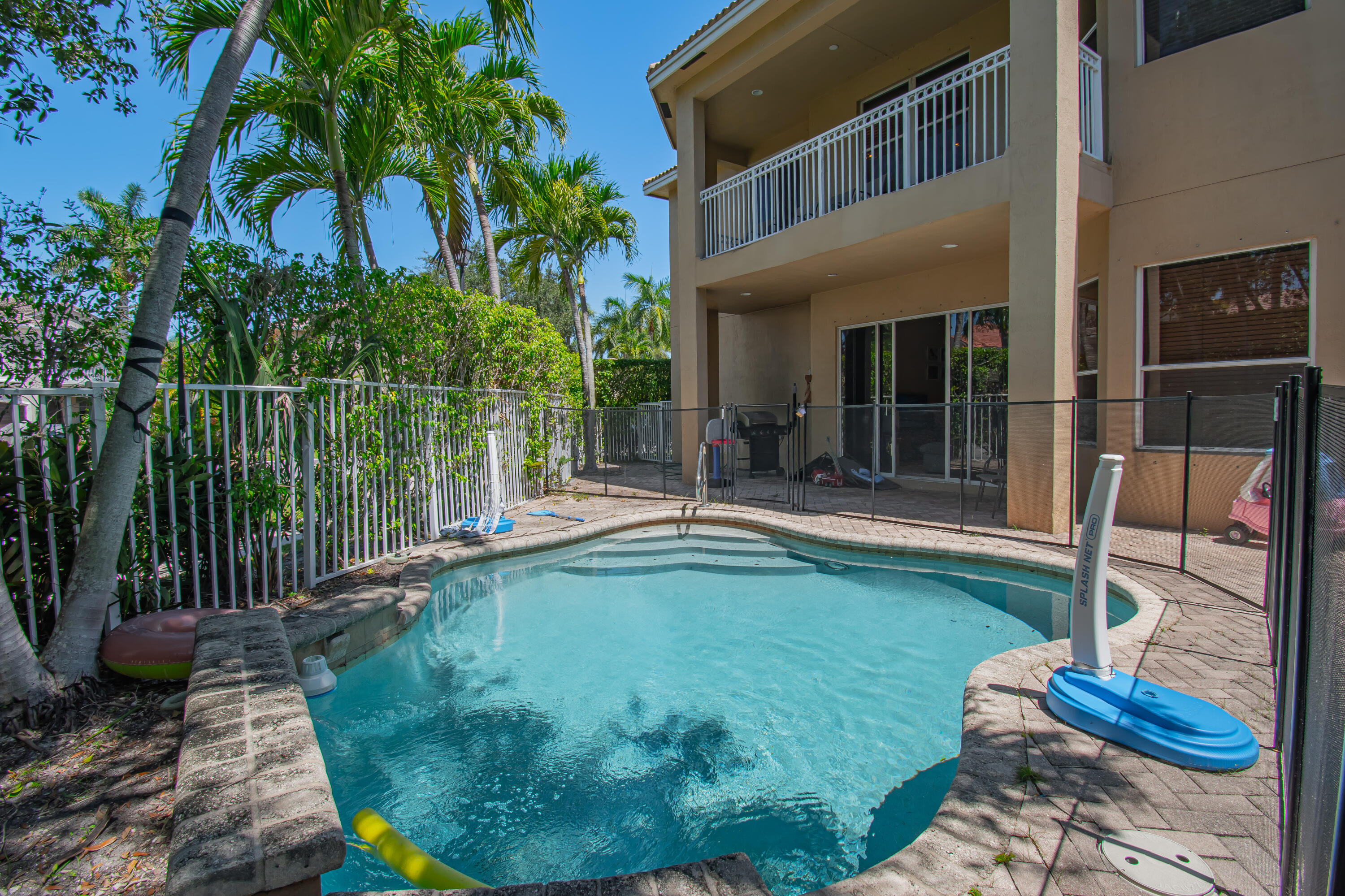 9851 Palma Vista Way Boca Raton, FL 33428 - Photo 32 of 33 a swimming pool with patio outdoor seating and yard