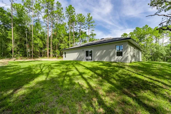 a house view with a outdoor space