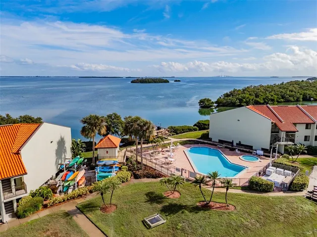 an aerial view of a houses with outdoor space