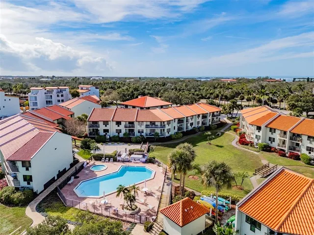 a view of a lake with sitting area