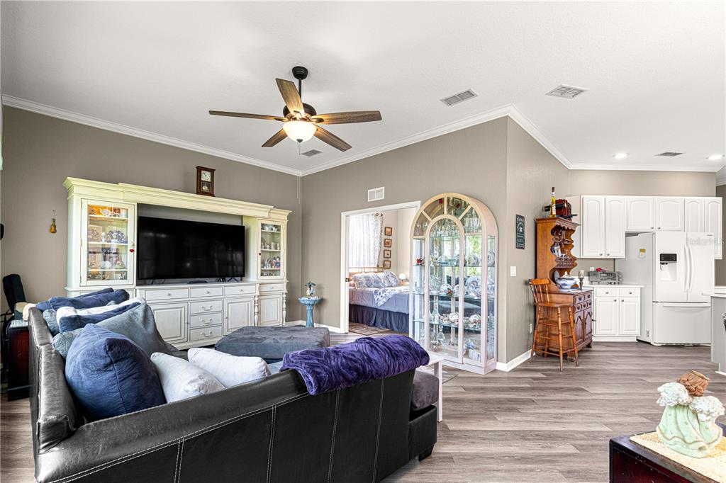 11799 Southeast 173rd Ln Road Summerfield, FL 34491 - Photo 20 of 83 a living room with furniture and a flat screen tv