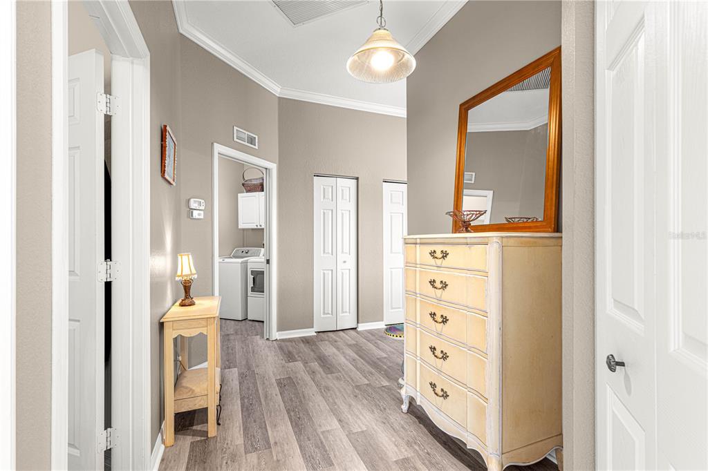 11799 Southeast 173rd Ln Road Summerfield, FL 34491 - Photo 29 of 83 a view of a hallway with wooden floor and closet