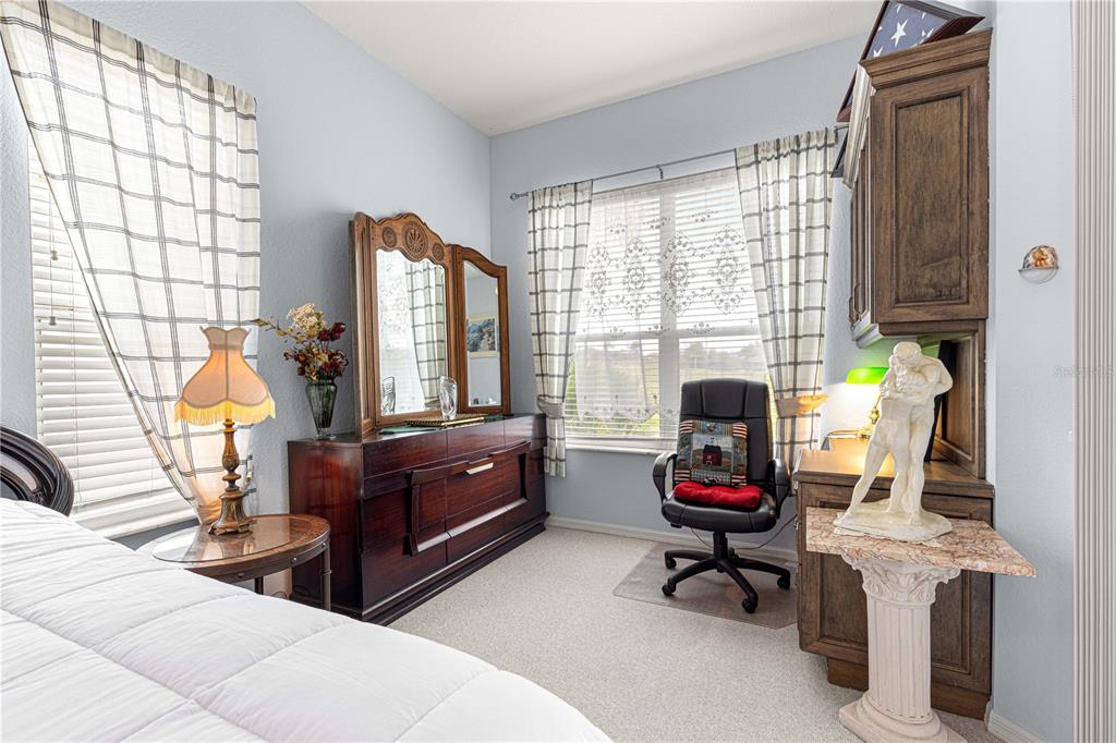 11799 Southeast 173rd Ln Road Summerfield, FL 34491 - Photo 34 of 83 a living room with furniture and a window