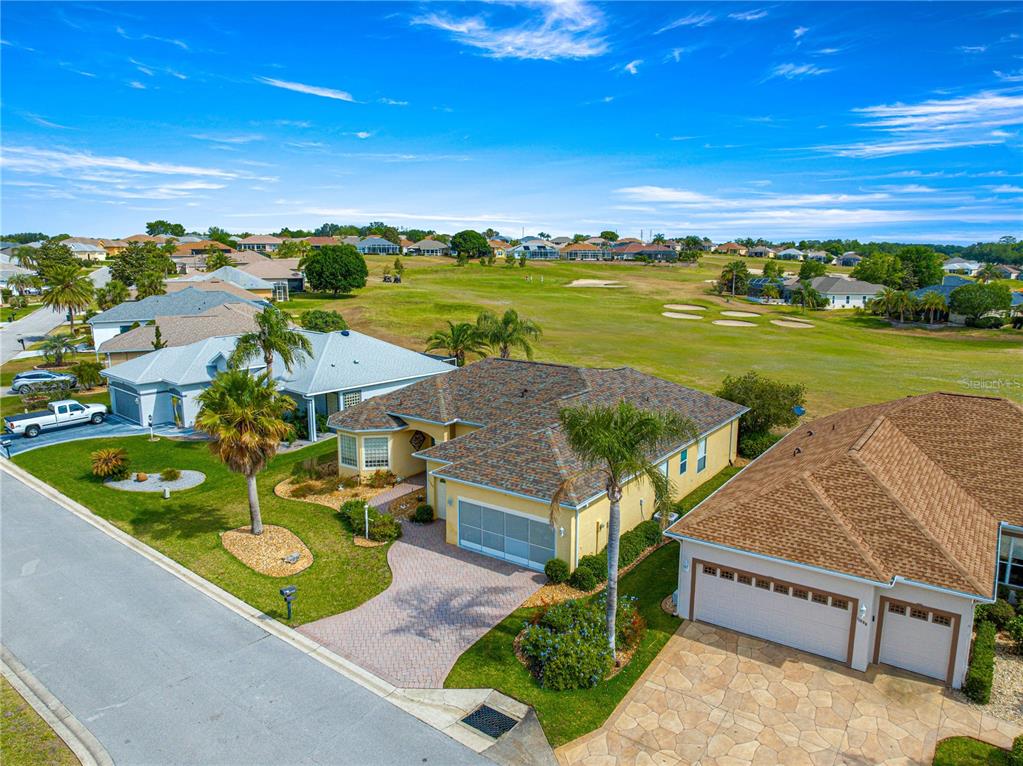 11799 Southeast 173rd Ln Road Summerfield, FL 34491 - Photo 57 of 83 an aerial view of a house with a ocean view