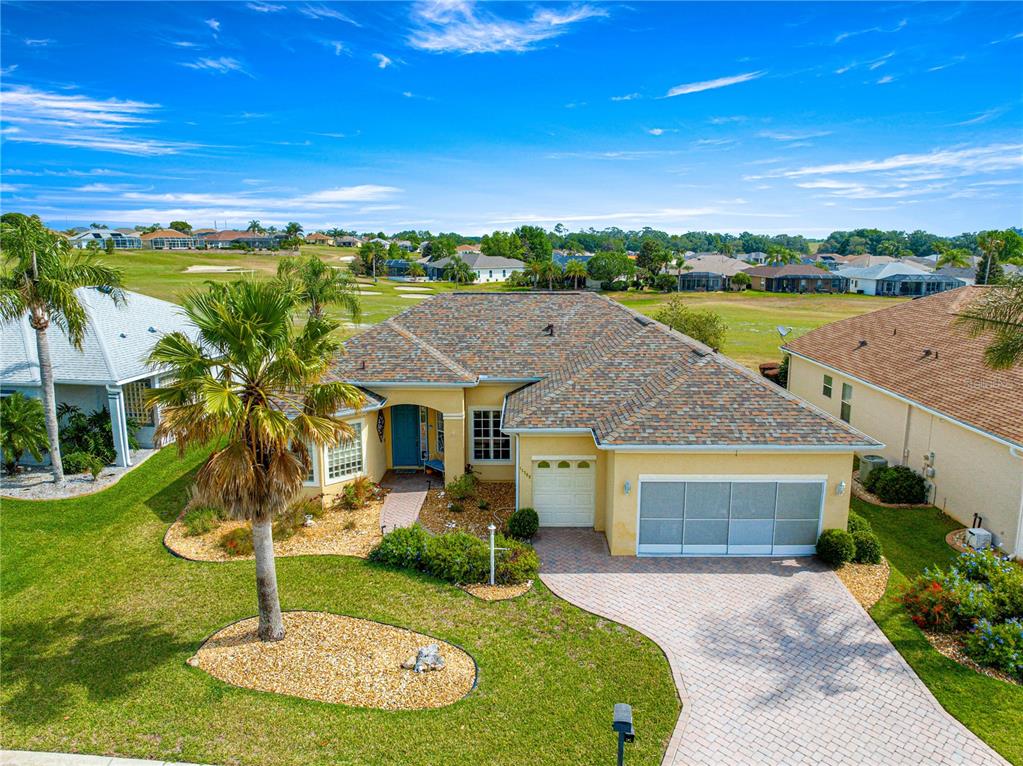 11799 Southeast 173rd Ln Road Summerfield, FL 34491 - Photo 62 of 83 a front view of a house with a yard