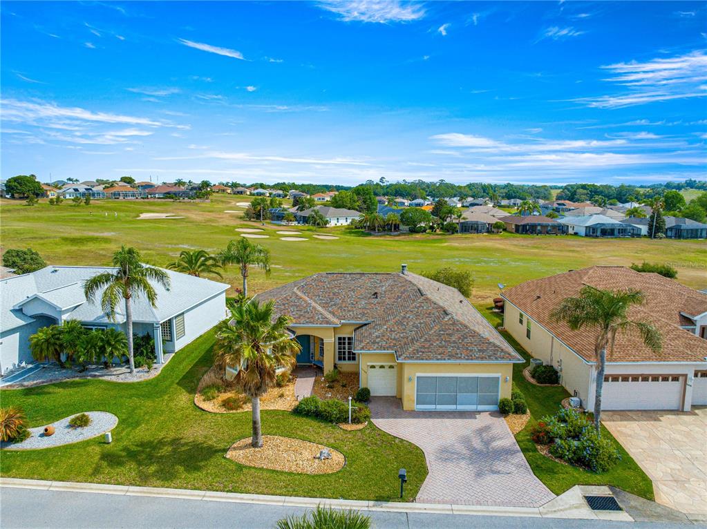 11799 Southeast 173rd Ln Road Summerfield, FL 34491 - Photo 63 of 83 a view of a house with outdoor space and ocean view