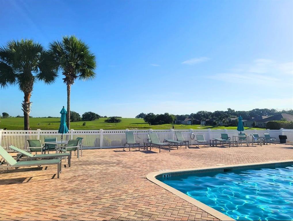11799 Southeast 173rd Ln Road Summerfield, FL 34491 - Photo 81 of 83 a view of outdoor space with seating