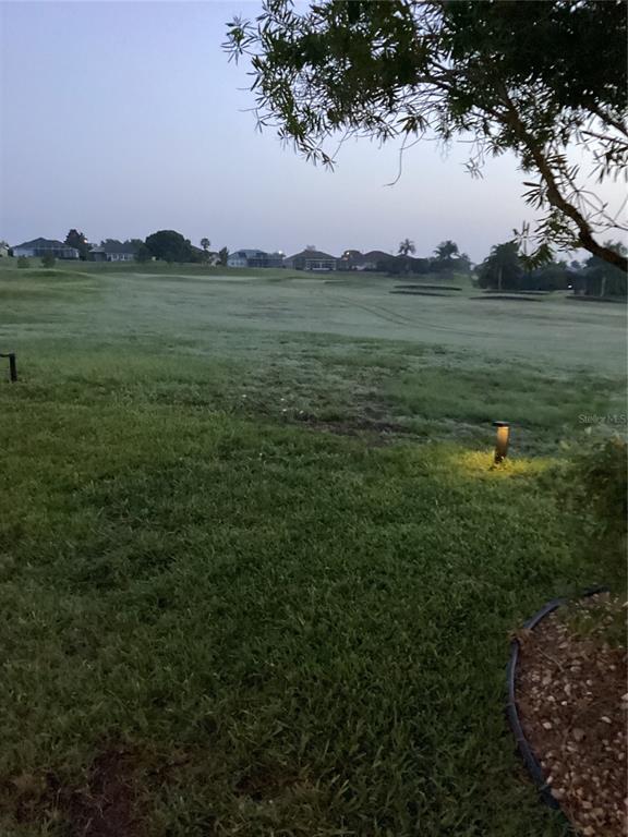 11799 Southeast 173rd Ln Road Summerfield, FL 34491 - Photo 83 of 83 a view of a green field with an ocean view