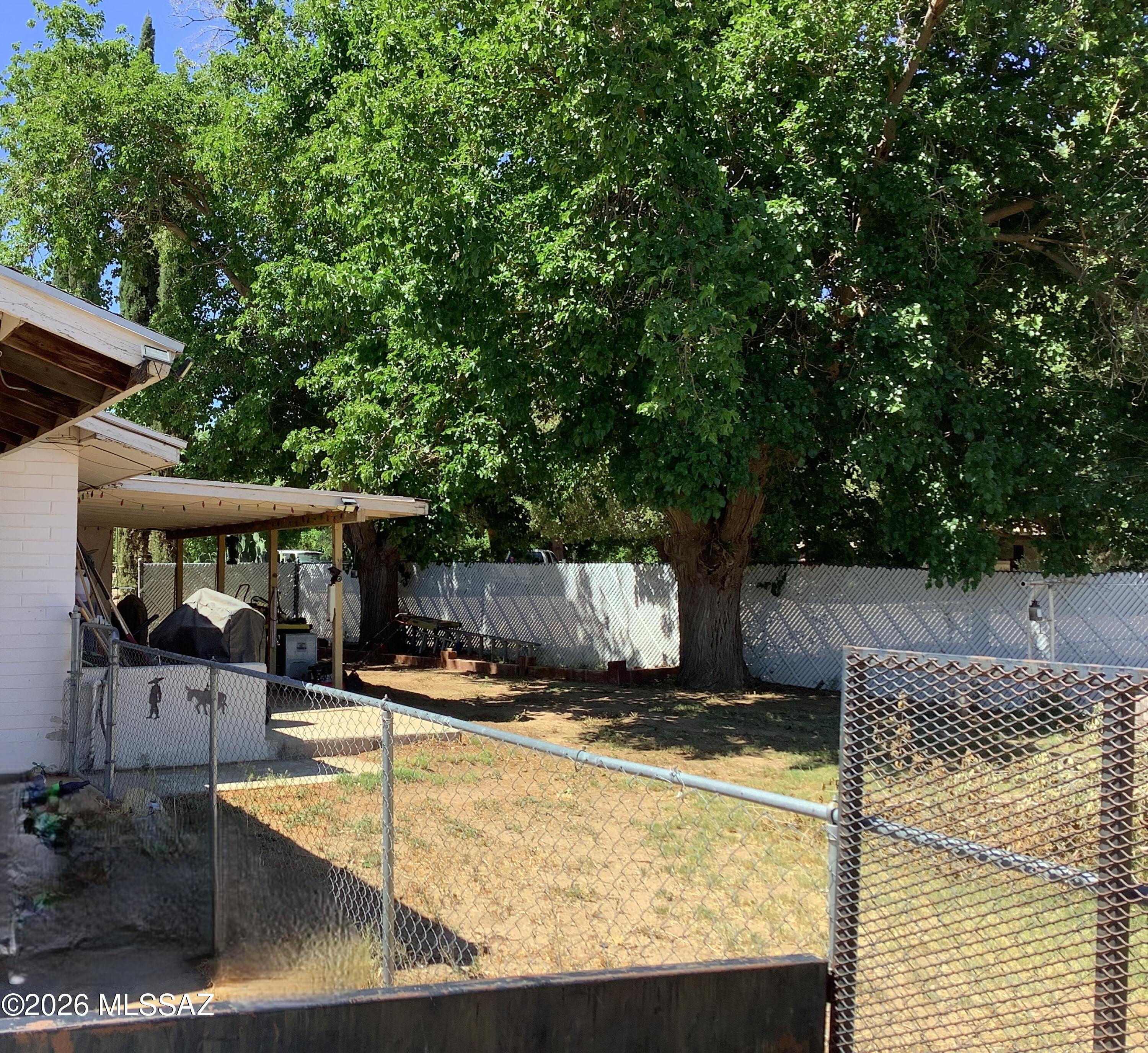 502 3rd Street Bowie, AZ 85605 - Photo 32 of 46 SIDE YARD WITH COVERED PORCH