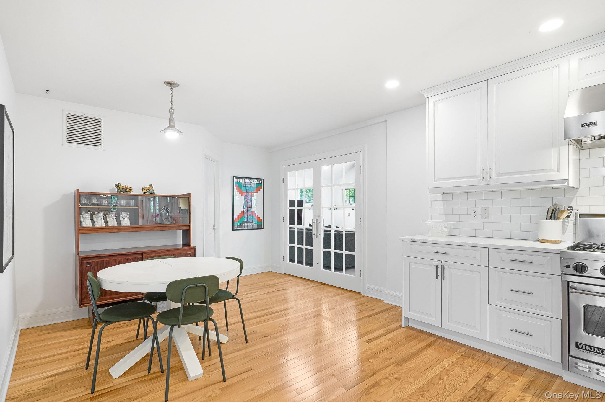60 Hillside Lane New Rochelle, NY 10804 - Photo 11 of 44 a view of a dining room with furniture and wooden floor