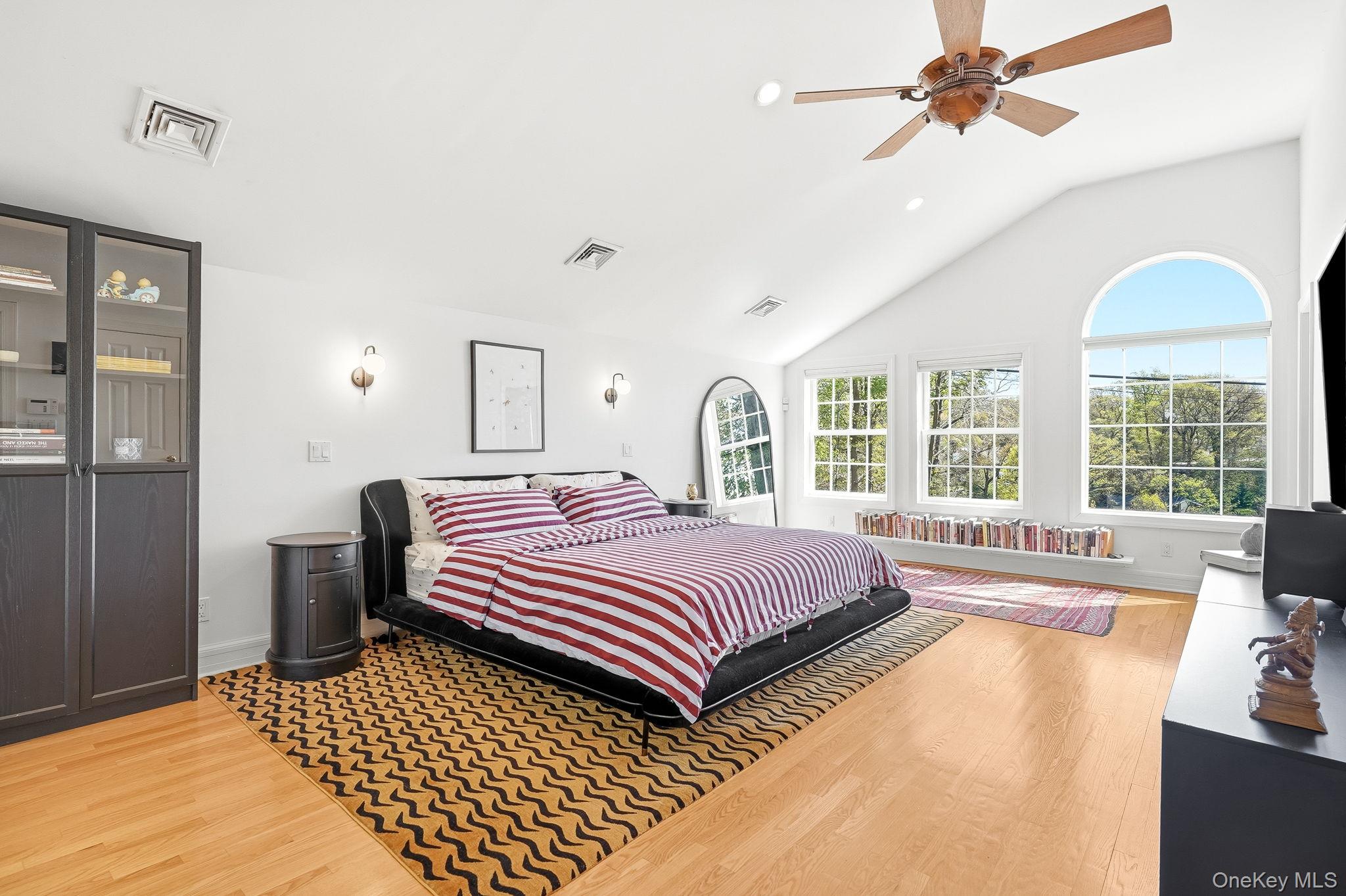 60 Hillside Lane New Rochelle, NY 10804 - Photo 23 of 44 a bedroom with a bed and a large window